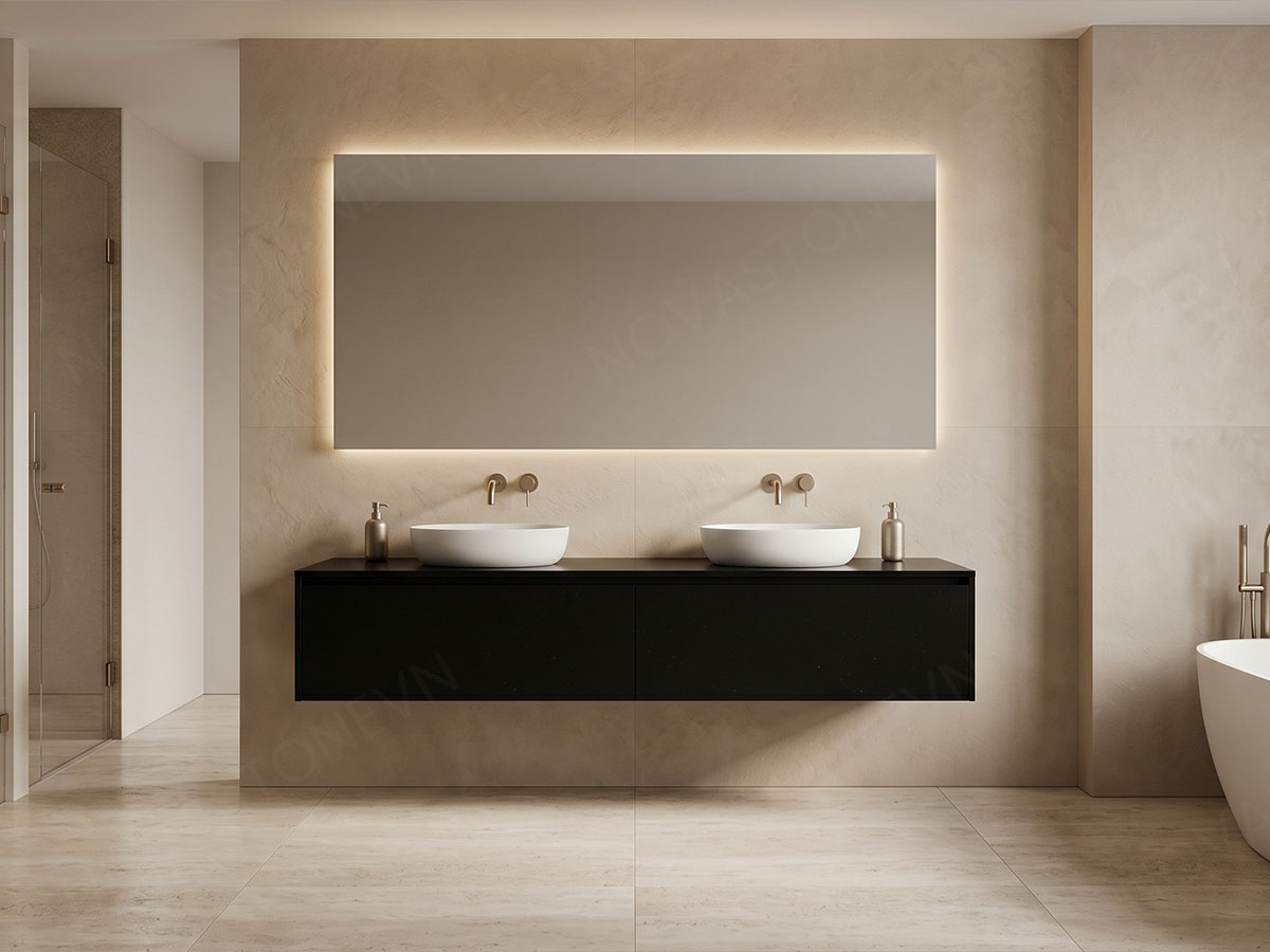 A luxury modern hotel bathroom interior designed for high-end hospitality projects, featuring a floating vanity made from pure solid black quartz slab with perfectly uniform deep black color and subtle polished reflection, seamless fabrication